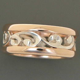 R251b Silver and Rose gold carved koru band